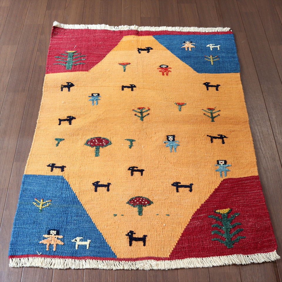 ギャッベキリム　遊牧民の織る風景のラグ110×82cm黒山羊・スカートをはいた女の子