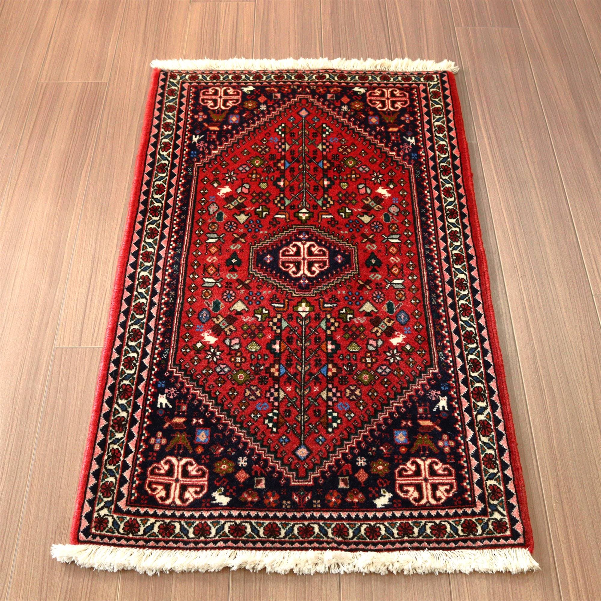 イランの手織り絨毯 アバディ109×65cm 赤い六角メダリオン
