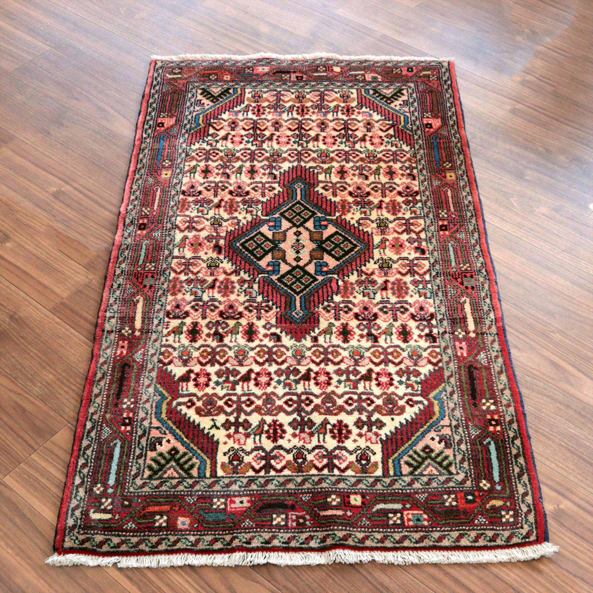 イランの手織りラグ ナハバンド138×78cm メダリオンと幾何学文様 ベージュ 手織りラグ