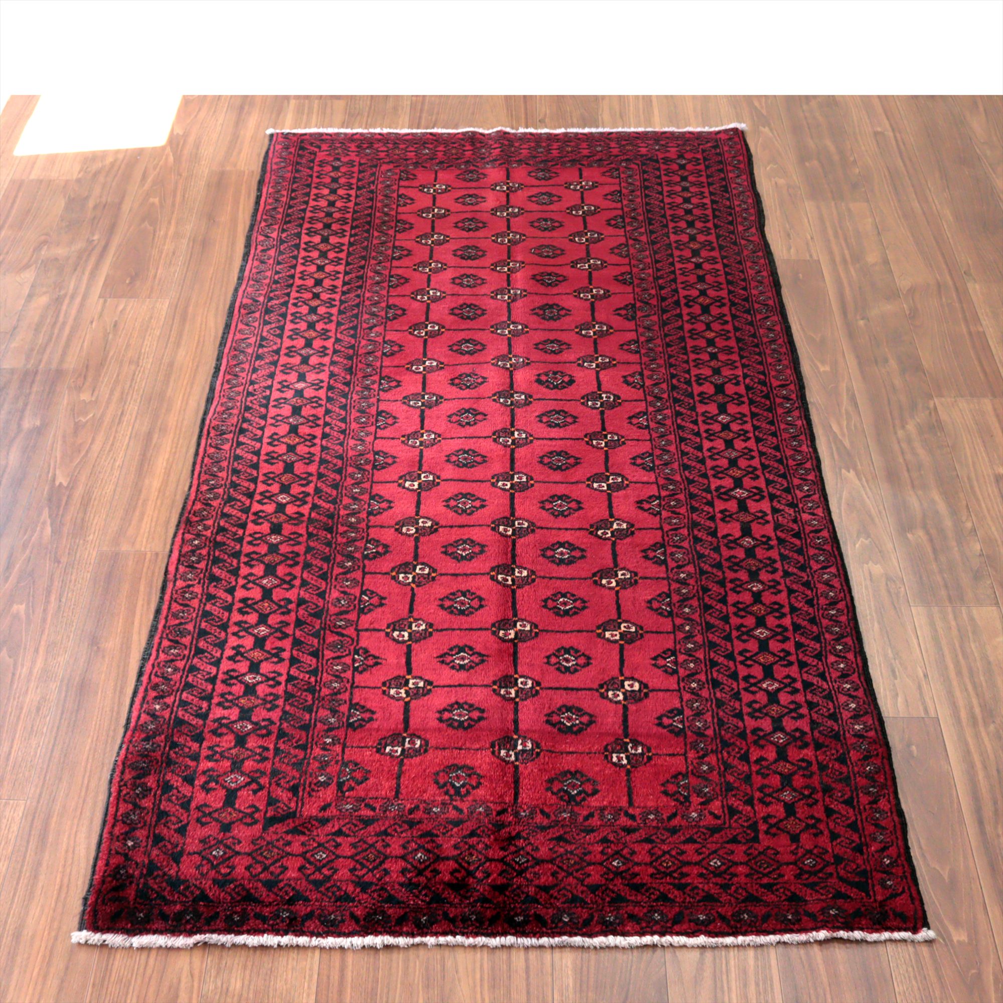 イランの手織りラグ バルーチ214×115cm 連なる幾何学模様 レッド