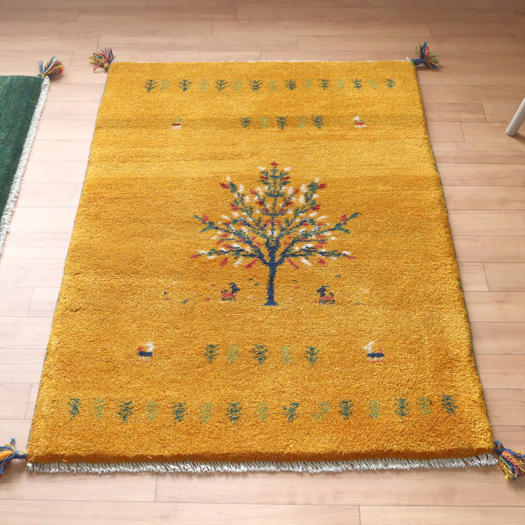 ギャッベ カシュカイ族の手織りラグ113×79cm イエロー 花の咲く樹と動物たち