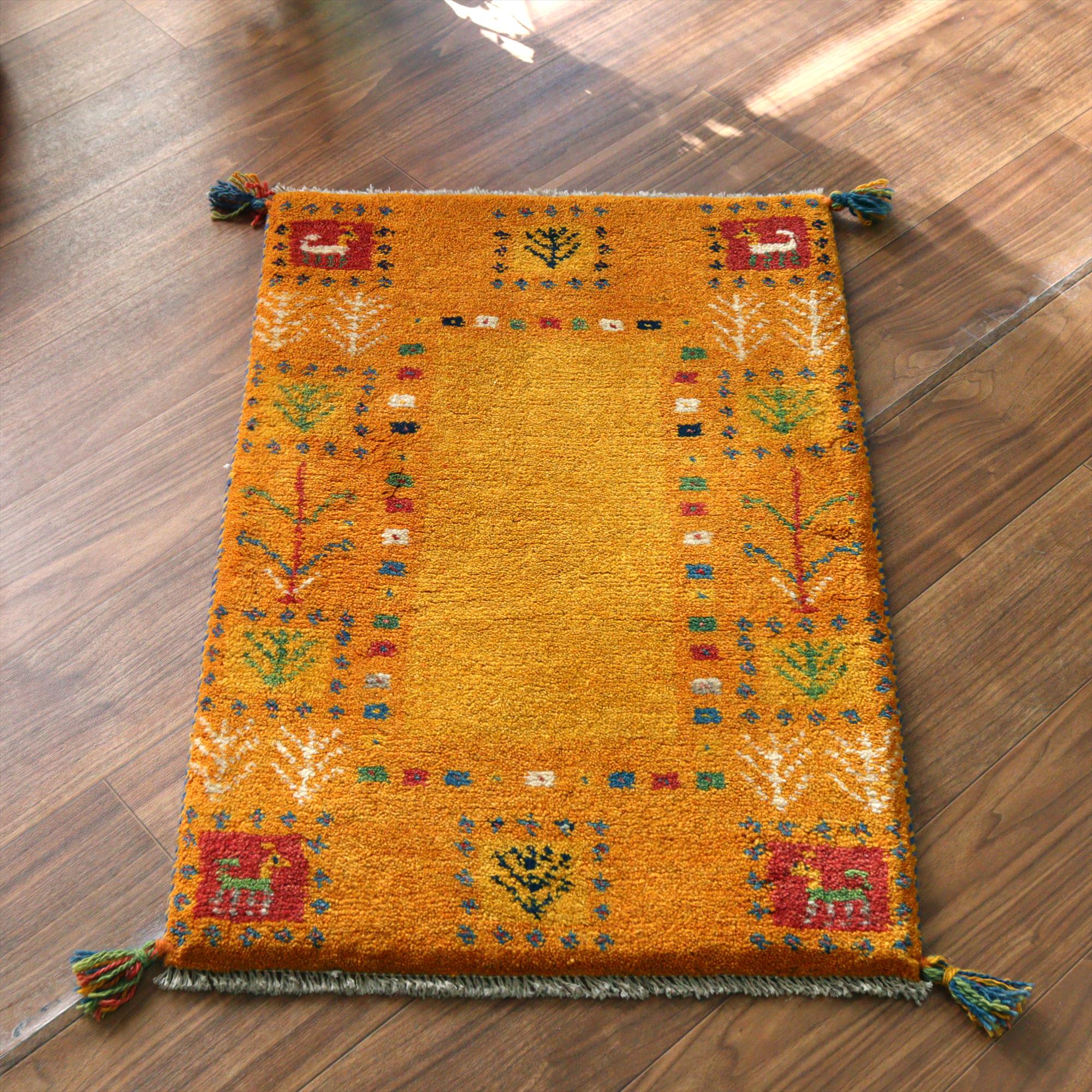 ギャッベ イラン産手織りラグ 88x60cm オレンジ 動物と植物