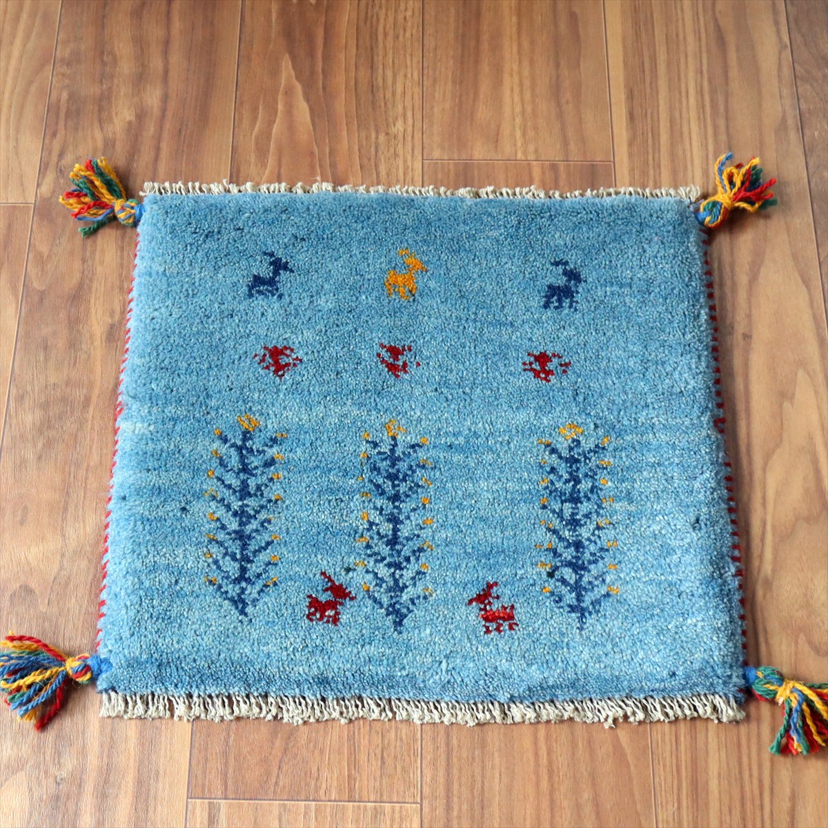 ギャッベ イラン産手織り 座布団サイズ40×44cm アクアブルー 動物と連なる生命の樹