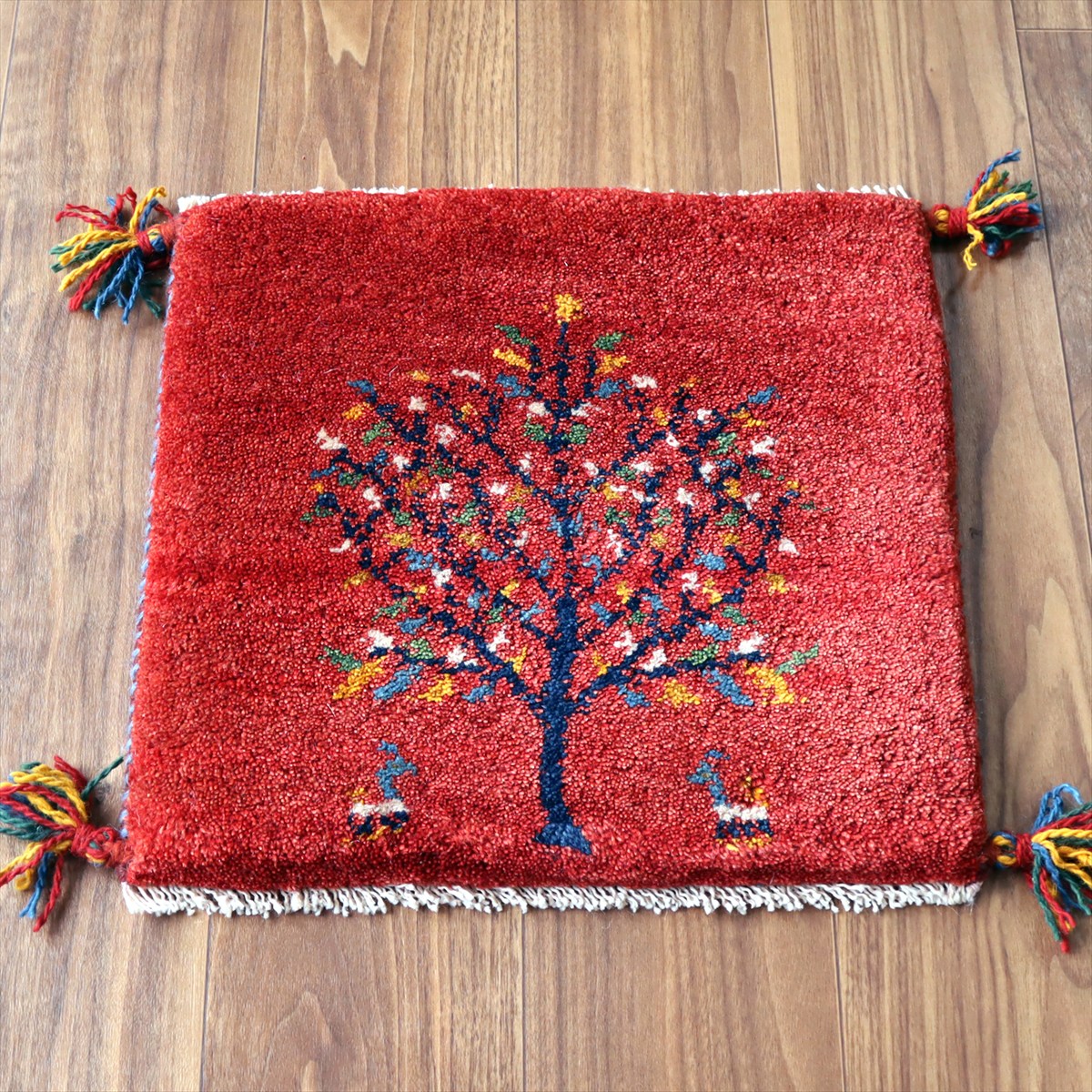 ギャッベ イラン産手織り 座布団サイズ40×43cm レッド カラフルな花の咲いた樹と動物